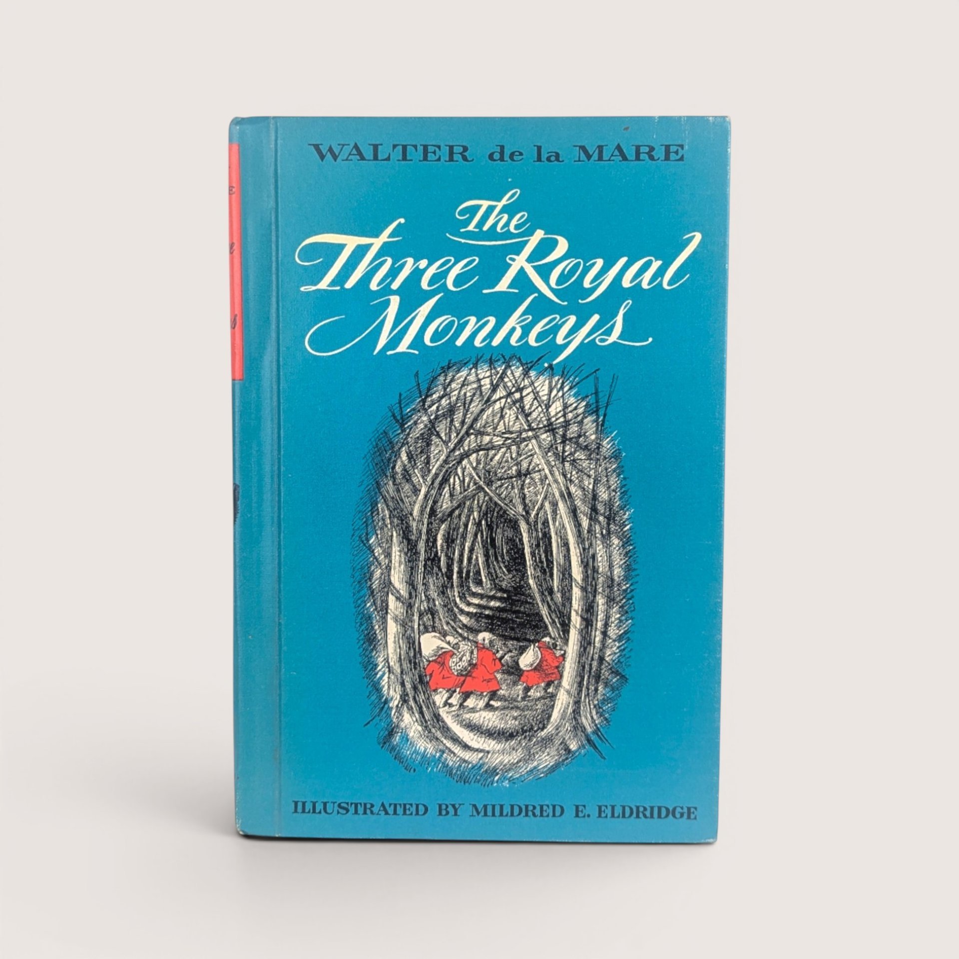 Vintage 1966 hardcover book The Three Royal Monkeys by Walter de la Mare featuring a bright blue cover and black and red illustration.