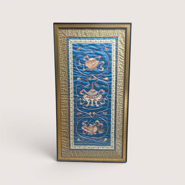 Framed vintage Asian silk embroidery panel featuring traditional ceremonial vessels on blue silk.