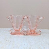 Vintage Cambridge pink glass sugar and creamer set on a matching double-well tray. Features 10-sided decagon panels and sharp geometric handles. 3.5 inches tall.