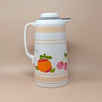 Vintage Diamond Brand vacuum serving pitcher in white with "Misa Fruit" pop-art graphics of oranges and cherries. Includes original pink and white display box. 10 inches tall.