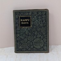 A small, 1904 leather-bound book titled "Happy Days: A Shakespeare Birthday Book." The dark cover is intricately embossed with a floral rose pattern and gold-foil lettering, showing a soft, aged patina on the edges.