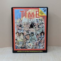 A vintage board game box for "TIME: The Game." The cover features a dense, colorful collage of historical figures from the 20th century, including JFK, Princess Diana, and an astronaut, set within a bold red and black border.