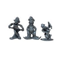 A trio of vintage silver-toned pewter clown figurines. One is in a deep curtsy, another is mid-stride in a classic circus pose, and the third is a dapper clown with a tall hat and buttons. Each figure has a matte metallic finish with fine sculptural details.