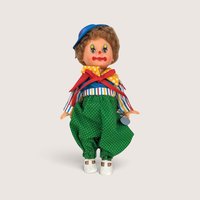 Vintage 1970s Horsman 10-inch clown doll with sleeping eyes wearing a colorful polka dot and stripe costume.
