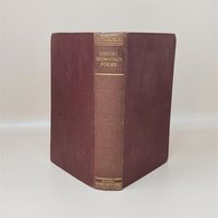 A burgundy cloth-bound hardcover book standing upright, featuring gilded typography on the spine for Robert Browning's Poems against a neutral background.