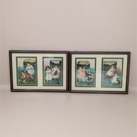 A set of two framed wall hangings, each containing two vintage-style advertising cards featuring Victorian children and puppies in pastoral outdoor settings.