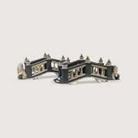 A pair of Department 56 Heritage Village ceramic Lionhead Bridges featuring gray arches and lion statues.
