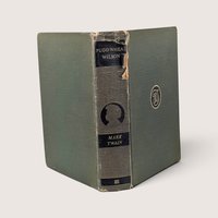 Antique 1922 green cloth hardcover book Pudd'nhead Wilson by Mark Twain with spine damage.