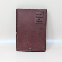 A 1918 hardcover book titled Causeries en France with a dark burgundy textured cloth cover and black stamped lettering