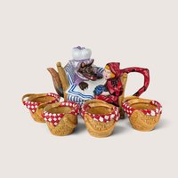 Vintage Dept 56 Little Red Riding Hood ceramic teapot and four basket-style teacups with checkered rims.