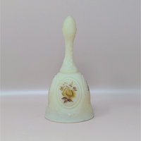 A vintage pale yellow satin glass bell featuring a handpainted brown and tan chocolate rose medallion