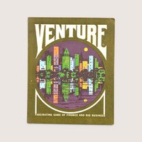 Vintage Venture game box in olive green featuring a circular illustration of a colorful city skyline water reflection.