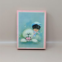 Box of vintage 1960s Darcy greeting cards featuring a big eye girl in a blue hat with a fluffy white dog and pink flowers