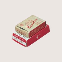 Two small vintage red and cream cardboard boxes for Sta-Rite and Lady Hamilton brand coiffure hair pins.