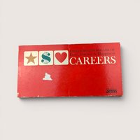 Vintage Careers board game box in bright red with star dollar sign and heart symbols