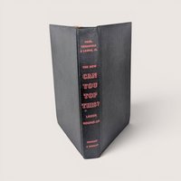 Vintage hardcover book spine in textured black cloth with bright red embossed text reading The New Can You Top This.