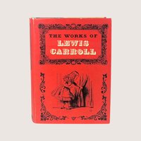 A vintage 1965 hardcover edition of The Works of Lewis Carroll with a vibrant red illustrated dust jacket.