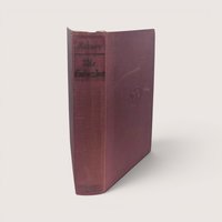 Spine view of the burgundy cloth vintage hardcover book for The Embezzlers by Valentine Kataev.