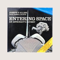 A vintage hardcover copy of Entering Space An Astronaut's Odyssey by Joseph P Allen featuring a space shuttle illustration.