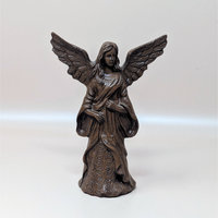 A vintage limited edition "Christina" angel figurine by Lori Johnson. The detailed resin figure has a bronze-like finish, stands approximately 6.25 inches tall, and is shown against a neutral background.