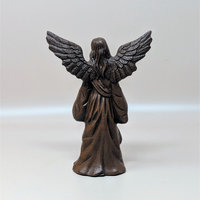 A vintage limited edition "Christina" angel figurine by Lori Johnson. The detailed resin figure has a bronze-like finish, stands approximately 6.25 inches tall, and is shown against a neutral background.