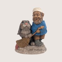 A vintage Tom Clark Cairn Studios resin gnome figurine titled Clean Sweep featuring a gnome holding a broom next to a rabbit.