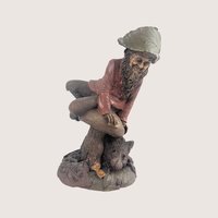 A vintage Tom Clark Cairn Studios resin gnome figurine titled Kevin featuring a gnome on a mushroom base next to a small animal.