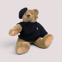 Vintage 1982 Bialosky teddy bear wearing a black beret and matching sweater sitting down.