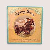 A vintage hardcover interactive book cover featuring an illustration of two Victorian children and a dog in winter.