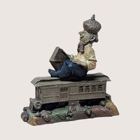 Vintage 1988 Tom Clark gnome named P.S. holding an envelope while sitting on a brown train car base.