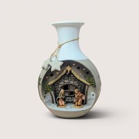Vintage 1990s white and grey ceramic light-up nativity vase with a detailed 3D Mary and Joseph stable diorama.  