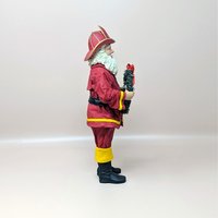 1990s Fabriche Fireman Santa Holding Wreath Figurine