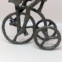 1970s Brutalist Cast Iron Man on Tricycle Sculpture