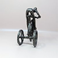 1970s Brutalist Cast Iron Man on Tricycle Sculpture