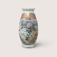 A hand-painted Japanese Meito porcelain vase featuring a pheasant bird amid colorful chrysanthemums and maple trees.