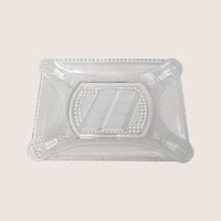 Clear rectangular pressed glass bread plate featuring an open Bible design in the center on a solid background.