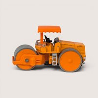A vintage orange diecast construction toy steam roller with grey metal rollers against a plain background