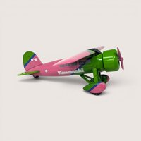 A die cast Lockheed Vega model airplane bank in vibrant pink and green with Kawasaki branding on a neutral studio background