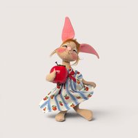 Annalee felt bunny doll dressed in a blue striped dress pattern with apples and holding a large red apple toy.