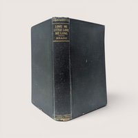 Vintage hardcover book titled Love Me Little, Love Me Long by Charles Reade with a dark clothbound spine.