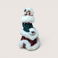 Vintage 1997 Winterthur Christmas tree topper doll in green and burgundy velvet with white faux fur trim.