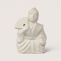 Vintage white ceramic Orchids of Hawaii R-21 samurai incense burner holding a fan.