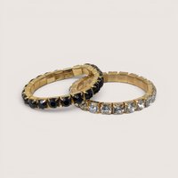 Vintage pair of gold tone stretch bracelets featuring black and clear crystal rhinestones.