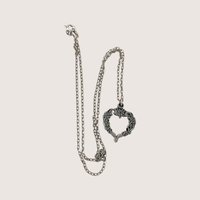 Vintage R. Tennsmed silver pewter heart pendant necklace with floral motifs and a link chain.