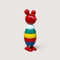 Vintage D.N.H. Holland painted wooden mouse stacking toy with colorful rings and red feet.