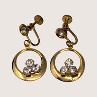 Pair of vintage 1950s gold-tone screw-back drop earrings with circular hoops and sparkling rhinestones.
