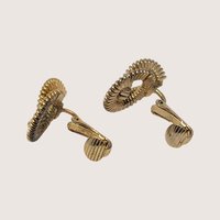 1980s Textured Gold Tone Swirl Clip On Earrings
