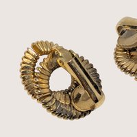 1980s Textured Gold Tone Swirl Clip On Earrings