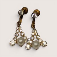 Pair of vintage 1950s gold-tone screw-back drop earrings with triangular rhinestone frames and faux pearls.