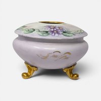 Antique Royal Austria hand painted lavender porcelain footed hair receiver with purple daisies and gold feet